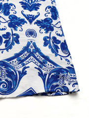 Blue and white patterned maxi dress fabric detail