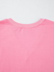 Pink cotton V-neck blouse with ribbed neckline detail
