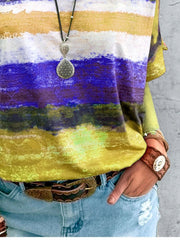 Casual t-shirt with brushstroke stripes in yellow, white, and purple.