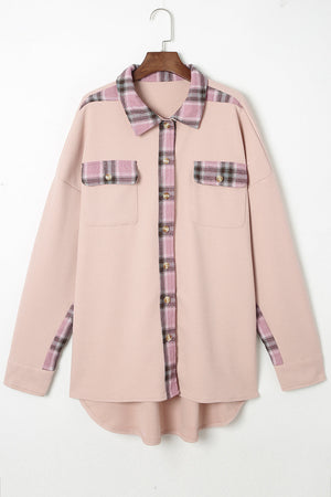Pink waffle knit overshirt with plaid trim on collar, pockets, and cuffs.
