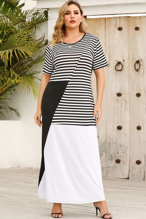 Asymmetric stripe block maxi dress in black and white with short sleeves and a round neckline.
