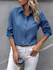 Blue linen-blend button-down shirt with a collared neckline and long sleeves.