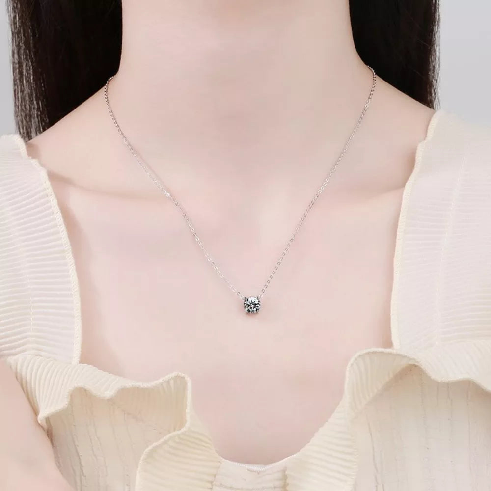 Radiant moissanite pendant necklace in sterling silver with a delicate chain.