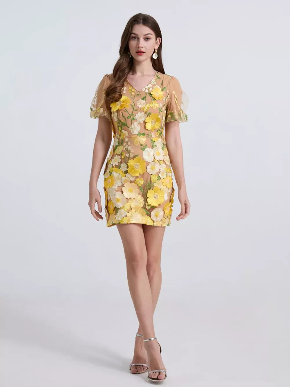 Yellow floral mini dress with puff sleeves and V-neck, featuring 3D applique flowers.