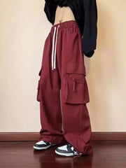 Burgundy relaxed fit cargo sweatpants with drawstring and multiple pockets.
