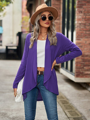 Electric purple asymmetrical drape front cardigan with open front and long sleeves.
