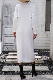 White textured knit henley midi dress with long sleeves and a button neckline.