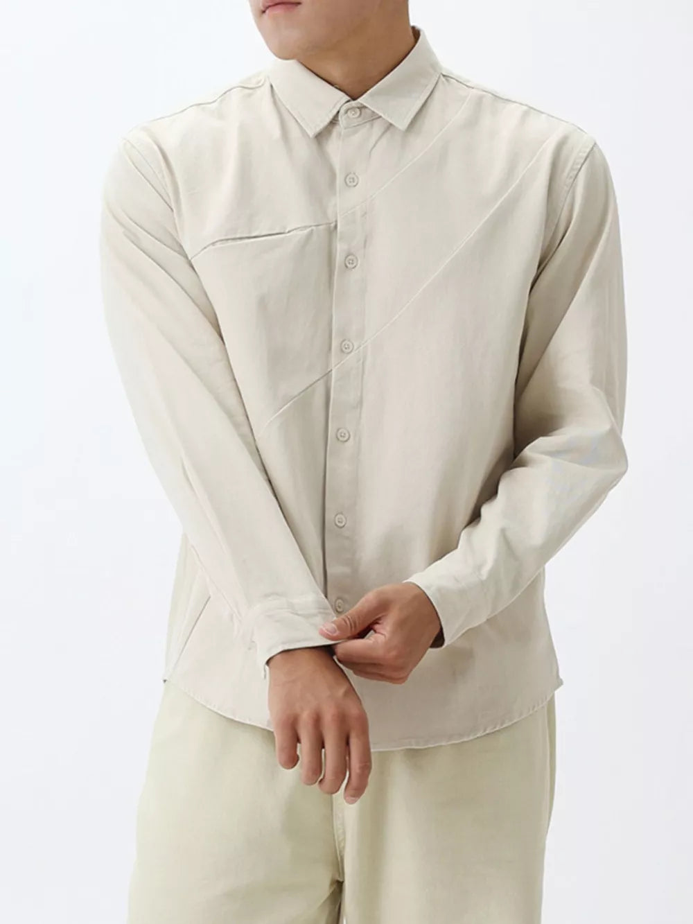 Apricot cotton buttoned long sleeve shirt with asymmetric paneling and chest pocket