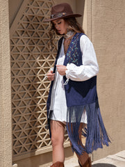 Navy faux suede vest with embroidered vines and long fringe detail.