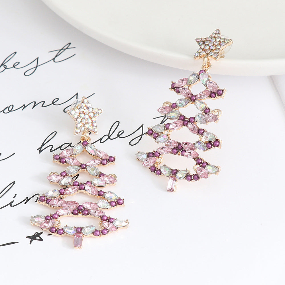 Festive crystal tree dangle earrings with star top in lilac and light green hues.
