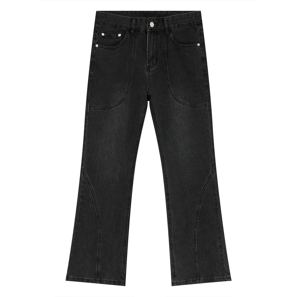 Black denim straight leg jeans with panel seam detailing and a slight flare.
