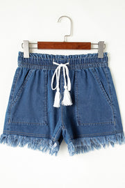 Navy denim drawstring shorts with frayed hem and tassel detail