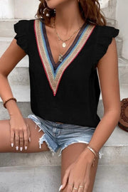 Black blouse with V-neck and rainbow embroidered trim, flutter sleeves