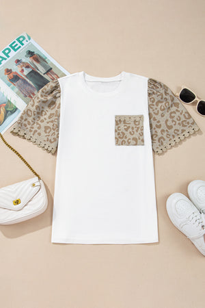 White cotton t-shirt with leopard print sleeves and lace trim, featuring a chest pocket.