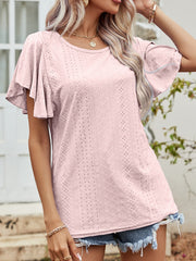 Blush pink eyelet blouse with flutter sleeves and a textured pattern.