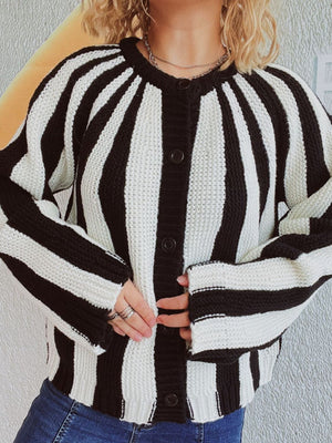 Bold stripe knit cardigan with button-up front and crew neck.