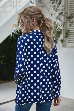 Dark blue polka dot open-front blazer with a classic collar and long sleeves.