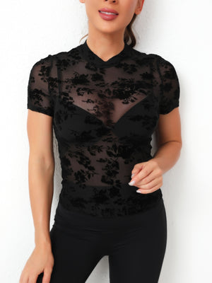 Black velvet floral mesh mock neck top with short sleeves.