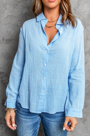 Light blue textured cotton relaxed fit shirt with button front and collar