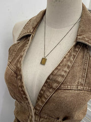 Khaki denim halter top with collar and button detail.