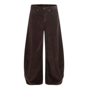 Brown corduroy wide-leg joggers with button fly and adjustable waist.