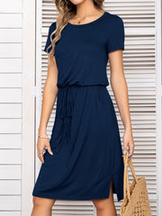 Navy midi dress with drawstring waist, short sleeves, round neck, and side slits.
