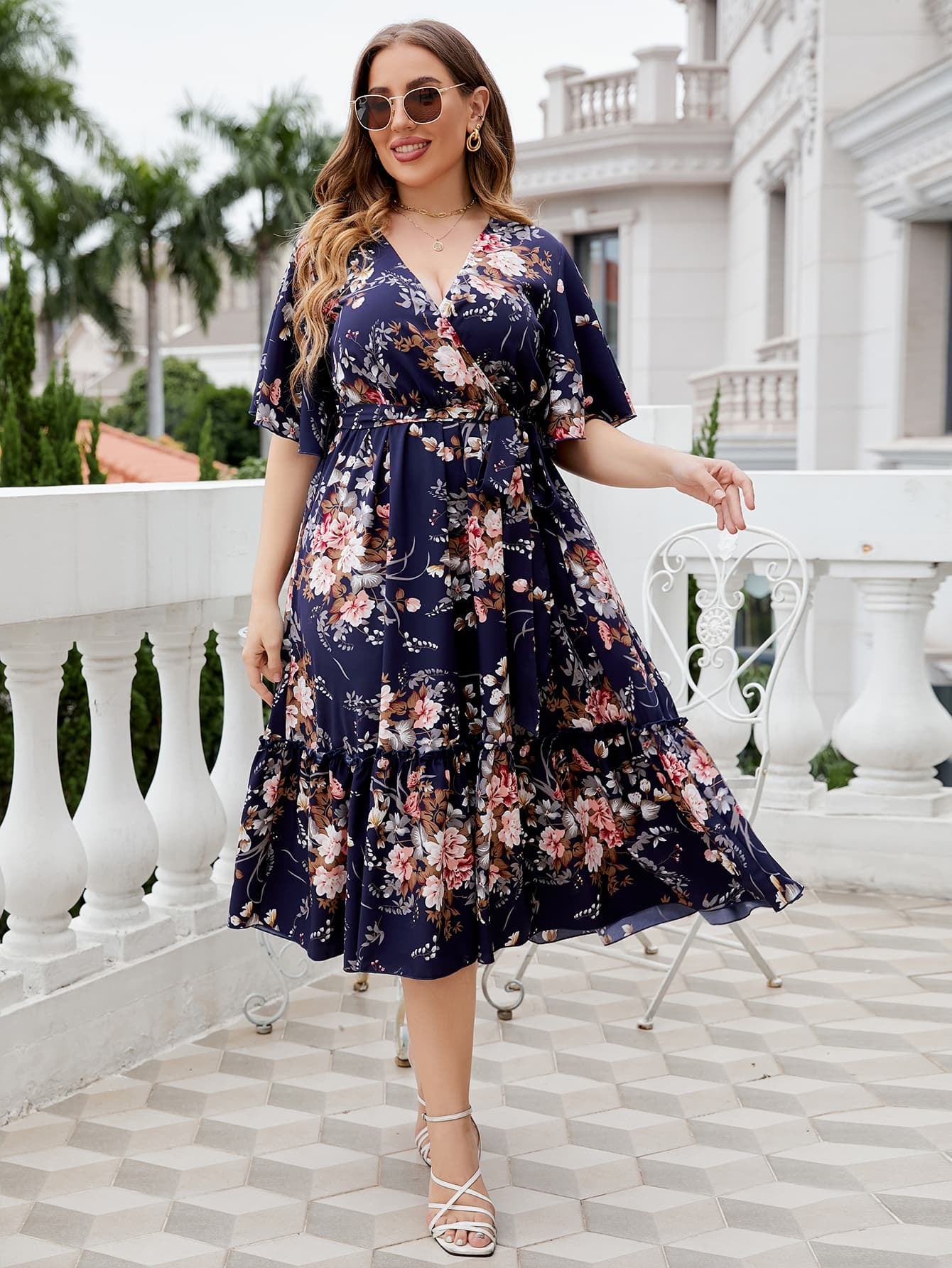 Floral wrap midi dress with flutter sleeves and tiered hem