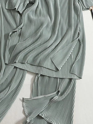 Elegant olive pleated two-piece set with side slits on top and pants.