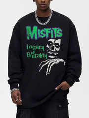 Black oversized long-sleeve sweatshirt with Misfits Legacy of Brutality skull graphic.