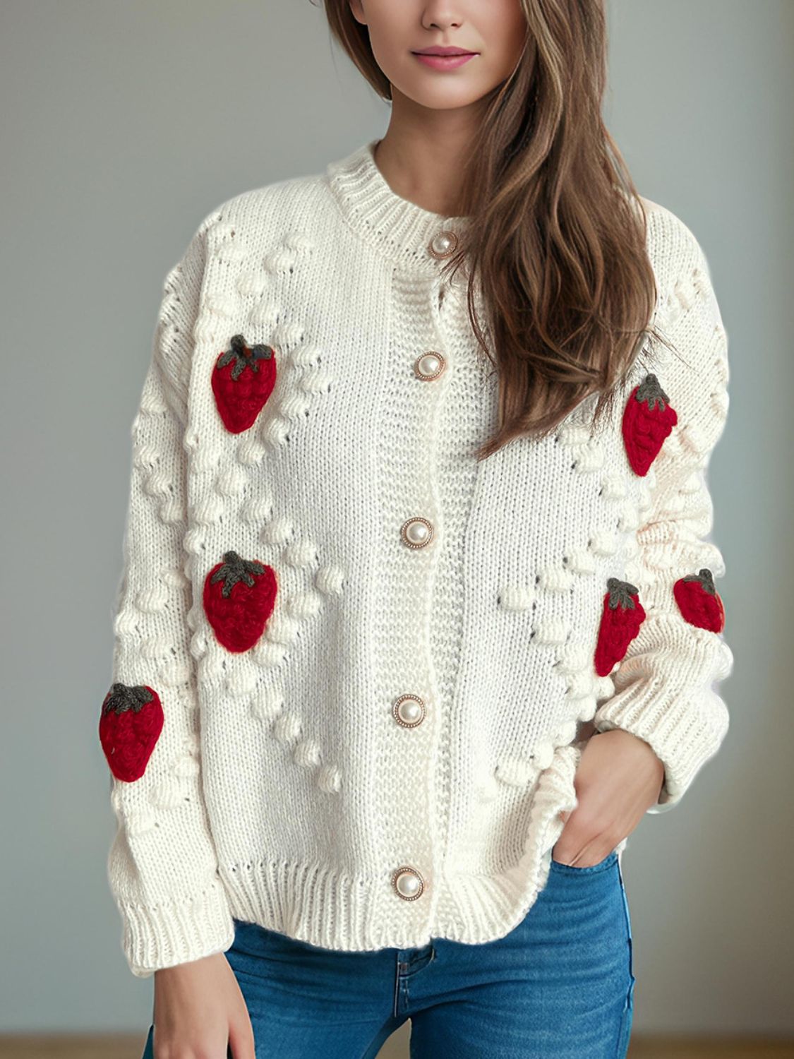 Cream knit cardigan with strawberry patches and pearl buttons