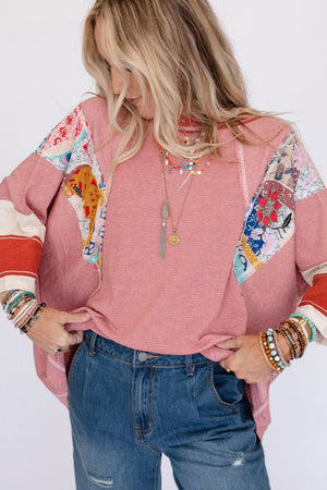 Patchwork stripe raglan sleeve tee in deep red with colorful boho patchwork details on sleeves.