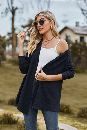 Dark Navy textured knit cardigan with drape front and long sleeves.