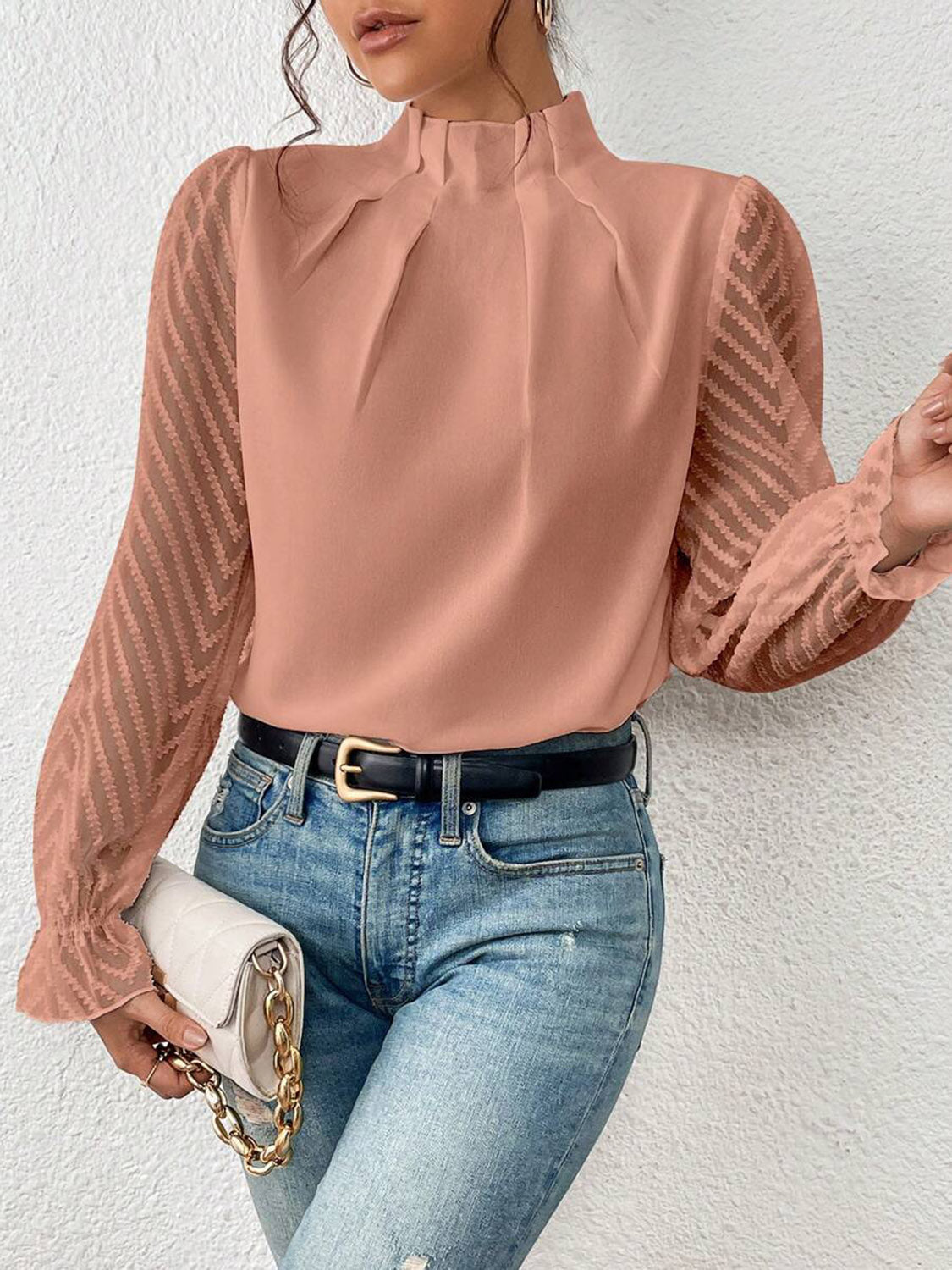 Chevron sleeve ruffle neck blouse in burnt coral with sheer chevron patterned sleeves