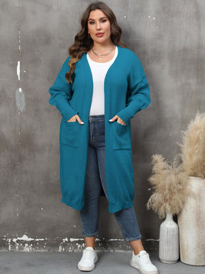 Teal oversized knit duster cardigan with patch pockets and long sleeves.