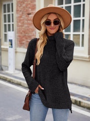 Black ribbed turtleneck sweater with side slits and long sleeves.