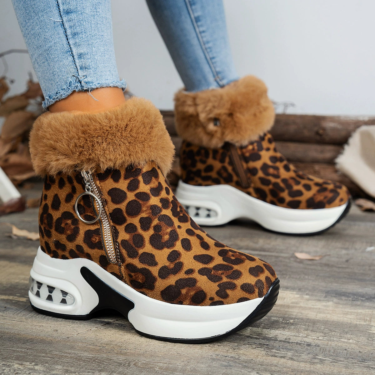 Leopard print plush ankle boots with side zipper and air cushion sole.