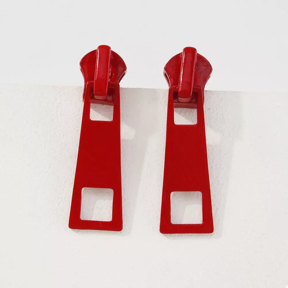 Red zipper drop earrings with square cutouts, made of alloy.