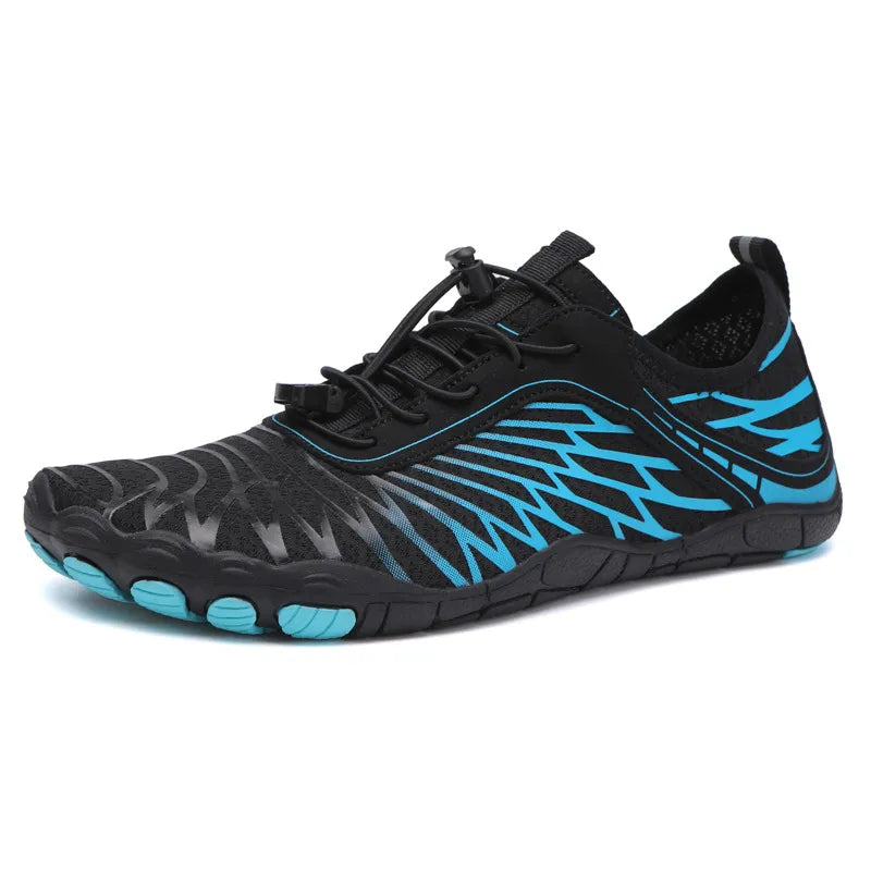 Black adaptive mesh trail runners with blue accents and quick-lace closure.
