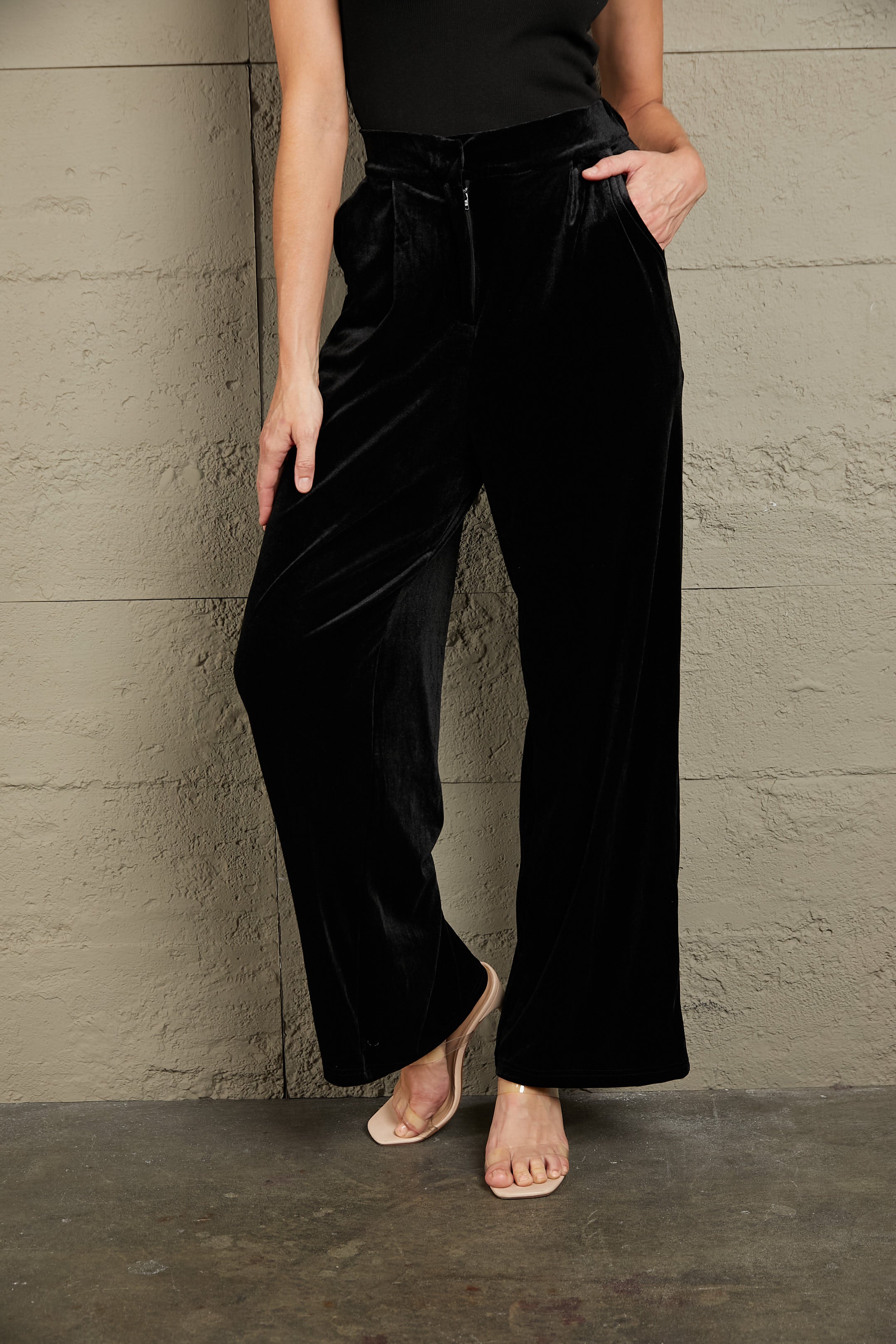 Black velvet palazzo trousers with high waist and wide leg