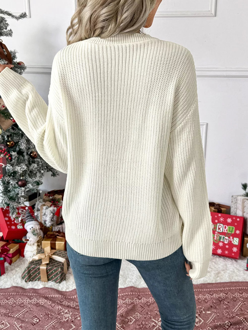 Cream ribbed knit sweater with crew neck and bow detail, acrylic, women's casual top.