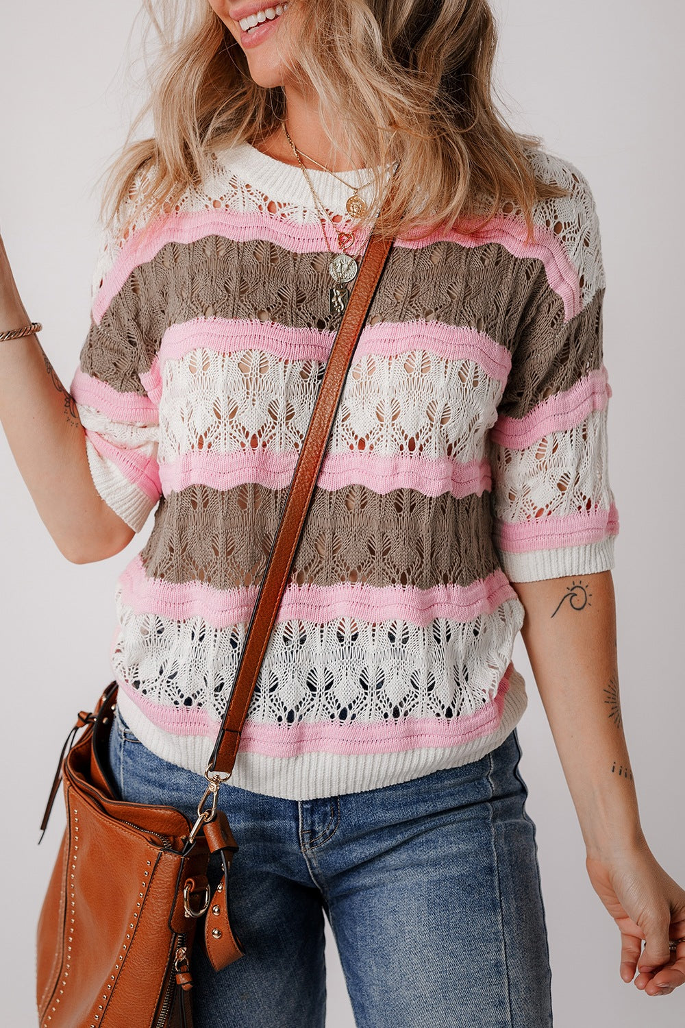 Striped openwork knit top with pink, taupe, and white stripes.