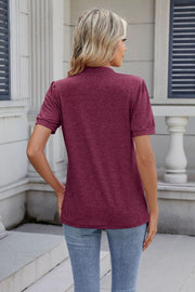 Plum purple short sleeve top with pleated yoke and keyhole neckline, casual chic style.
