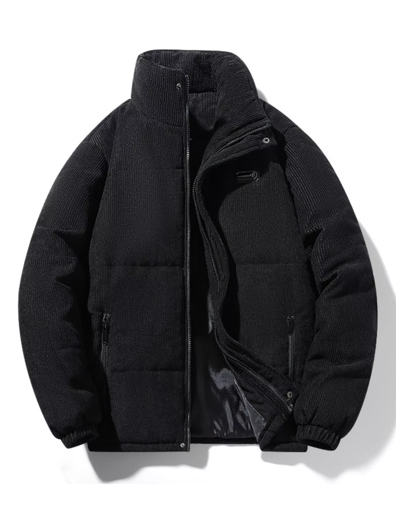 Black corduroy puffer jacket with high collar and zip closure.