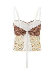 Mixed print corset cami with lace straps and tie front detail