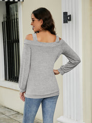 Off-shoulder square neck cutout top in heather grey with long sleeves.