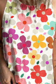 Floral halterneck tank top with a vibrant floral print and keyhole back detail.
