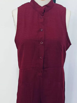 Wine red sleeveless button-down romper with a mock neck and front buttons.