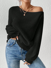 Black ribbed knit off-shoulder top with balloon sleeves and a casual fit.