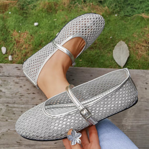 Silver mesh Mary Jane flats with strap and buckle detail.