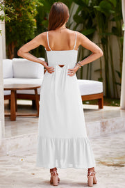 White smocked bodice maxi dress with cutout detail and tiered hem